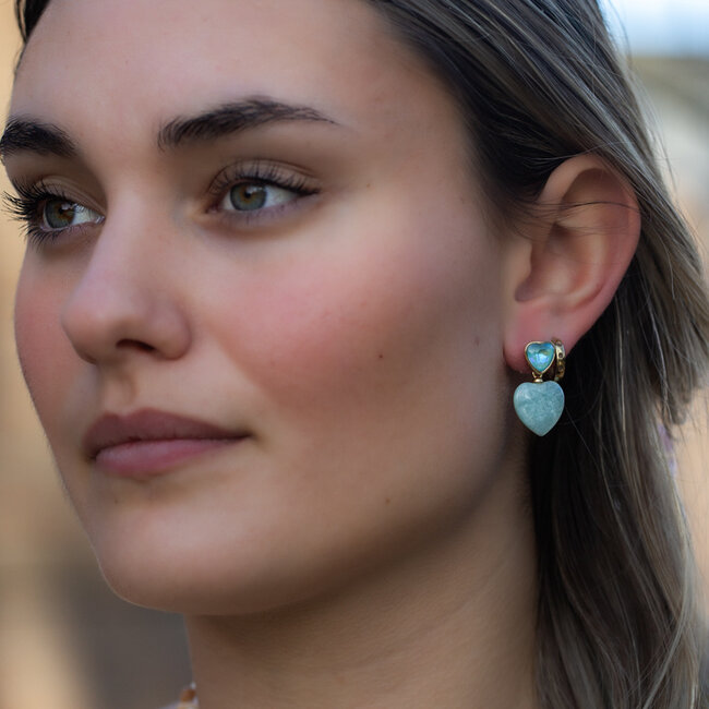 Oorbellen met turquoise hart en crystal steen