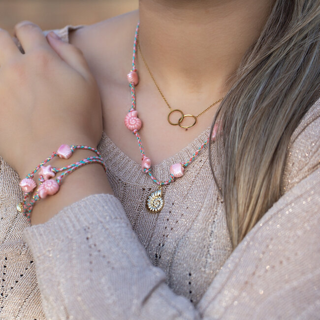 Armband met roze keramieken schelpjes en zeester