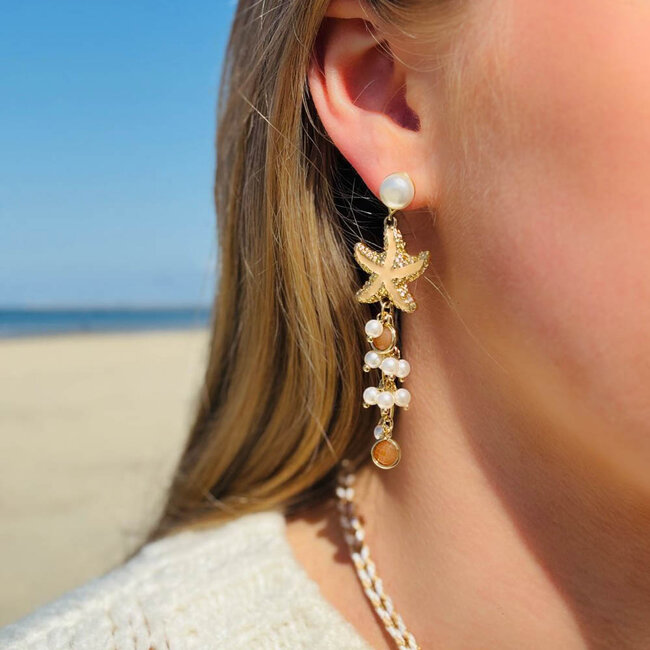 Beachy oorbellen met parels en zeester
