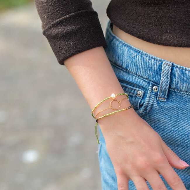Goud setje van 3 armbanden met parel en cirkel