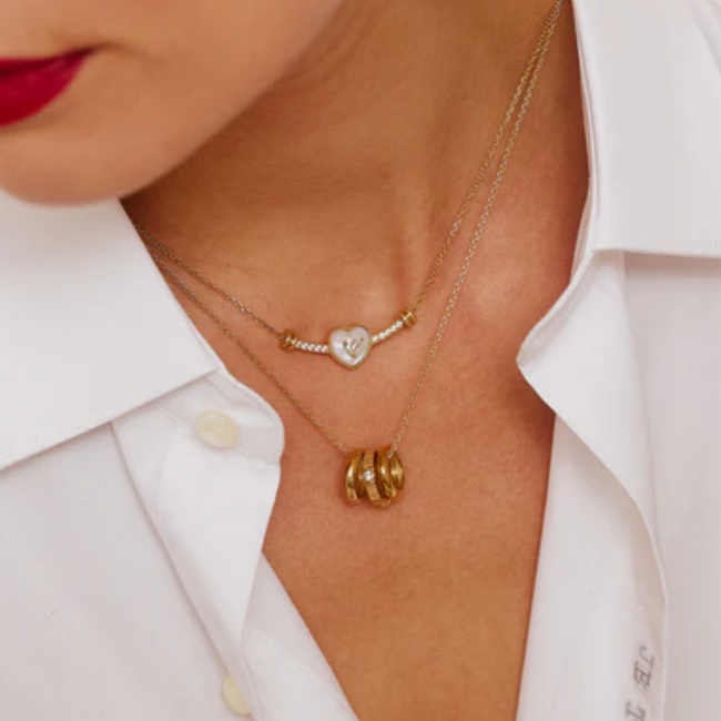 Goud ketting met crystal zirconia hartje of ringen