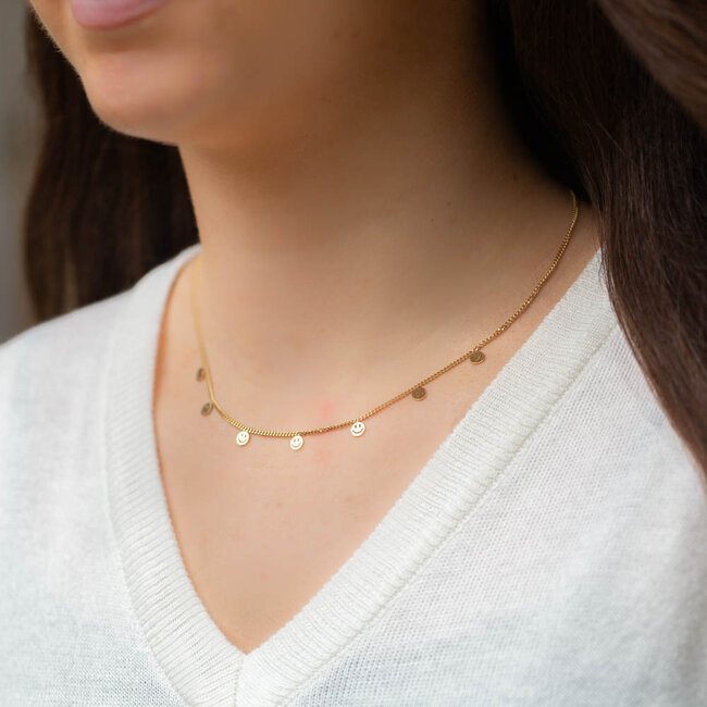 Day & Eve  Goudkleurige ketting met vrolijke smiley bedeltjes