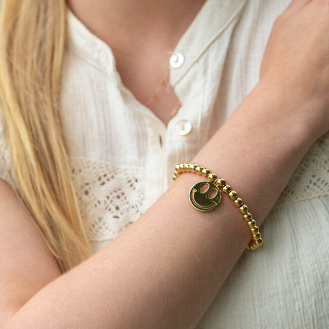 Day & Eve  Bolletjes goud armband  met smiley