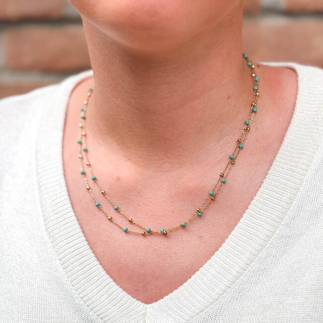ZAG  Bijoux Turquoise ketting met bolletjes goudkleurig