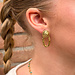 ZAG  Bijoux Gouden knoop statement oorbellen