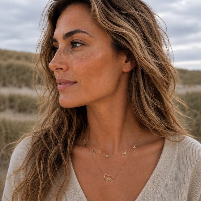 Day & Eve  Goud stainless steel ketting hartjes