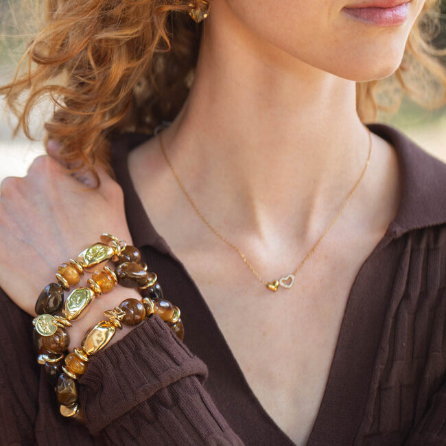 Biba Armband met grote kralen in warme bruin en goud tinten
