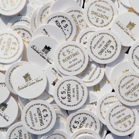 Plastic munten met thermoprint vanaf 1000 stuks