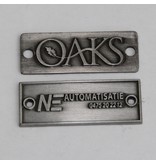 Voorbeeld van gegoten logoplaatje