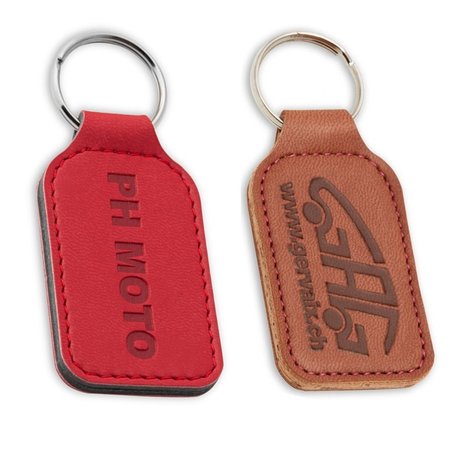 Leren of Kunstleren sleutelhangers 38x90mm met uw brandlogo.