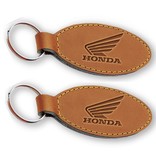 Leren of Kunstleren sleutelhangers in 110x40mm met jouw tekst of logo ingebrand