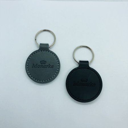 Leren of Kunstleren sleutel hangers Ø45x75mm met uw brandlogo.