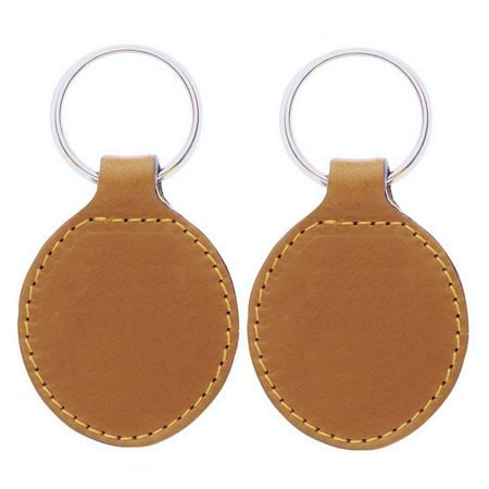 Leren of kunstleren sleutelhanger vrij rond met jouw logo. Sleutelhanger is 45x80mm