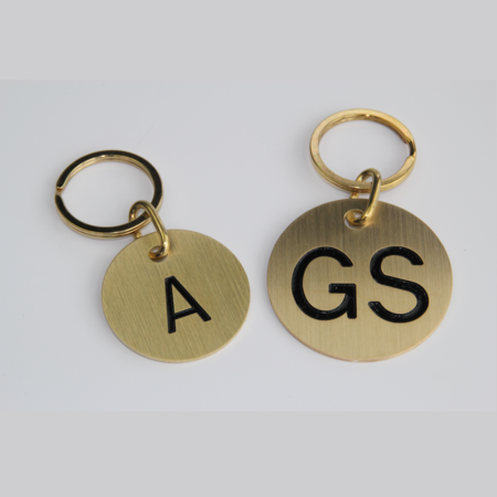 Cité hotelsleutelhangers Messing Rond met tussenschakel en platte ring