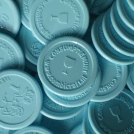 1000 Plastic reliëfmunten of gegraveerde munten in een eigen ontwerp vanaf 1000 stuks in de maat Ø25 en Ø29mm  met 2 niet gelijke zijden