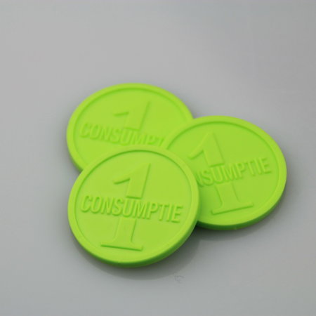 1000 Plastic reliëfmunten of gegraveerde munten in een eigen ontwerp vanaf 1000 stuks in de maat Ø25 en Ø29mm  met 2 niet gelijke zijden