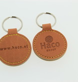 Leren of Kunstleren sleutel hangers Ø45x75mm met uw brandlogo.