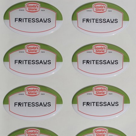 Domingstickers, stickers of logo's die bedekt worden door een laagje kunsthars.  Logoplaatjes voorzien van een laagje epoxy