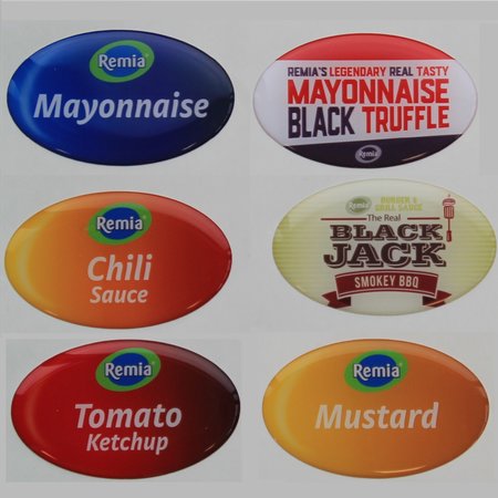 Domingstickers, stickers of logo's die bedekt worden door een laagje kunsthars.  Logoplaatjes voorzien van een laagje epoxy