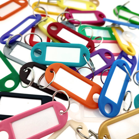 Sleutellabels met inschuifpapier in 55 x 22 mm in één kleur - per 100 stuks