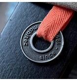 CombiCraft Gietlogo in metaal vanaf 100 stuks in kleinformaat, speciaal om aan stoffen kussens, gordijnen, karpetten of meubels te bevestigen.