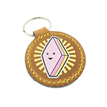 Ssleutelhanger van leer of kunstleer van Ø45 x 75mm met jouw tekst of nummering - per 1 stuk