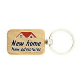 Houten sleutelhanger nieuw huis - New home, new adventures - per 1 stuk