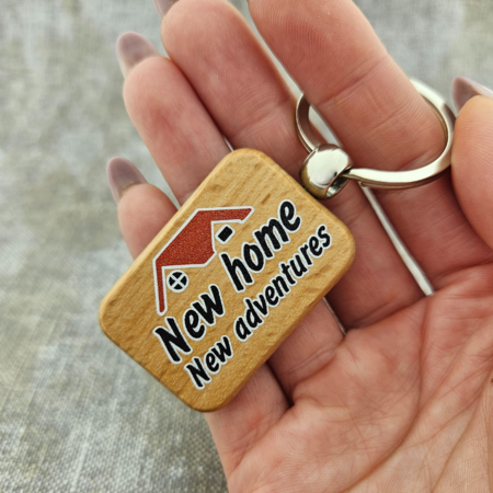 Houten sleutelhanger nieuw huis - New home, new adventures - per 1 stuk