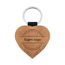 Leren sleutelhanger hart met ontwerp lichtbruin