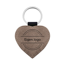 Leren sleutelhanger hart met ontwerp grijs