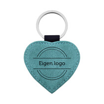 Leren sleutelhanger hart met ontwerp turquoise