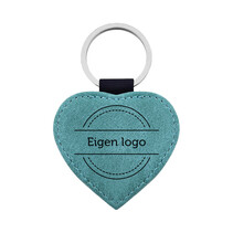 Leren sleutelhanger hart met ontwerp turquoise