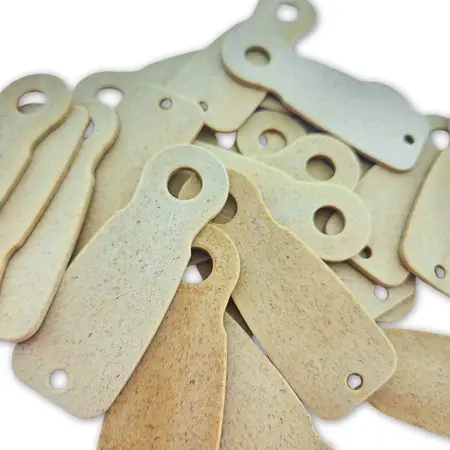 Blanco houtvezel Caddy-Key winkelwagenmunten €1 formaat - per 50 stuks