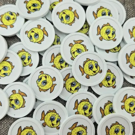 Kleine plastic munten Ø23mm met jouw eigen ontwerp - per 100 stuks