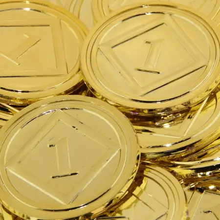 CombiCraft Glimmende geëloxeerde plastic munten goudkleurig Ø29mm - per 100 stuks