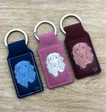 Leren sleutelhanger rechthoek met logo in donkerblauw 33x70mm - per 1 stuk