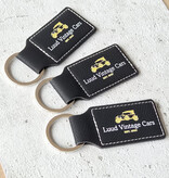 Leren sleutelhanger rechthoek met logo in zwart 33x70mm - per 1 stuk
