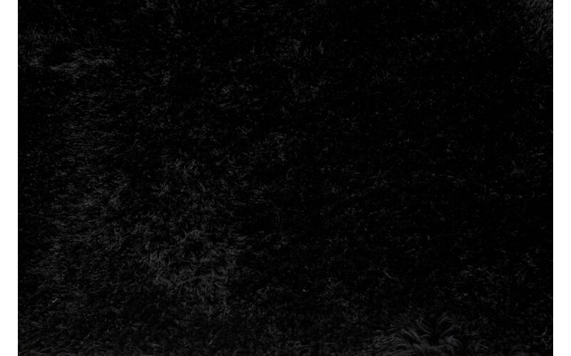 Ross 25 - Uniek hoogpolig ovaal vloerkleed in zwarte kleursamenstelling