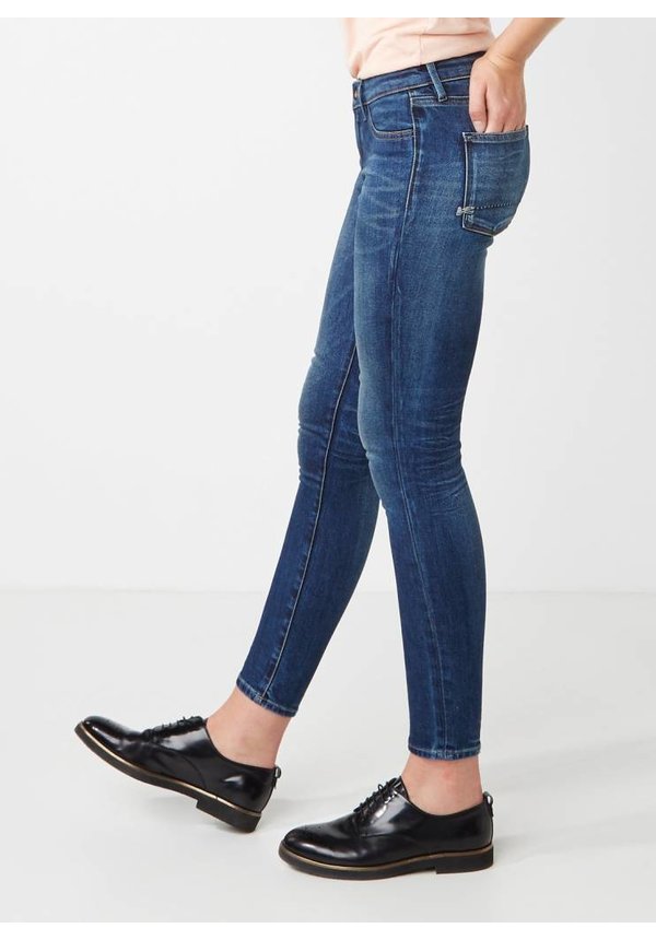 Mid rise skinny jeans met faded look