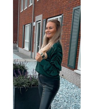 Groene blouse gesmokte mouwen