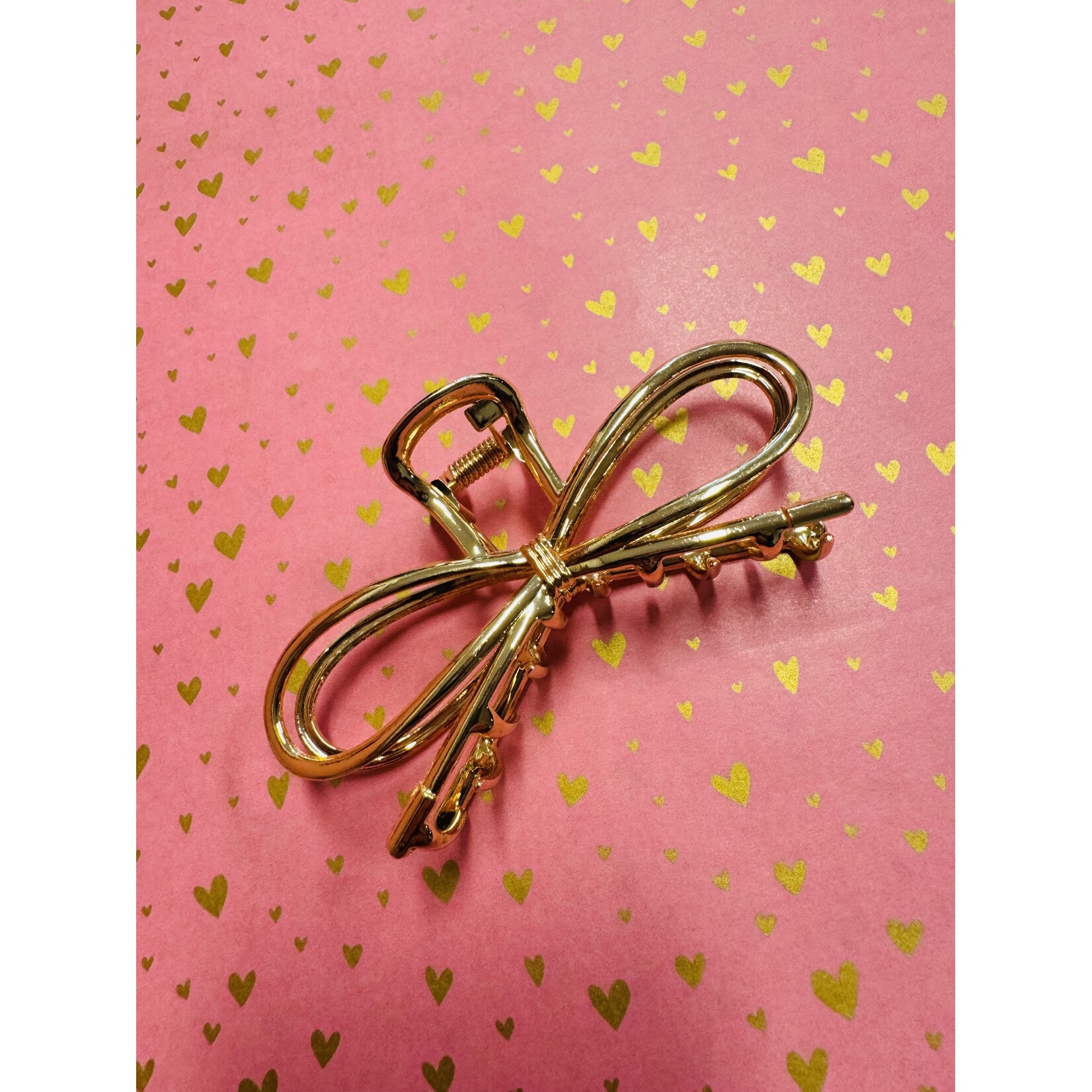 Bull golden bow hairclip