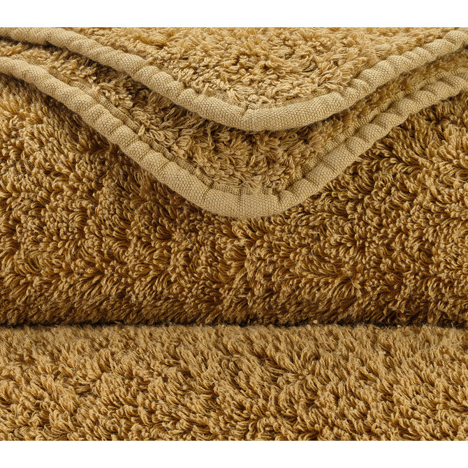 Abyss & Habidecor Super Pile Handdoek 55x100 840 gold Abyss & Habidecor Super Pile Handdoek 55x100 840 gold