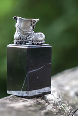 DTR Walking shoe on pedestal