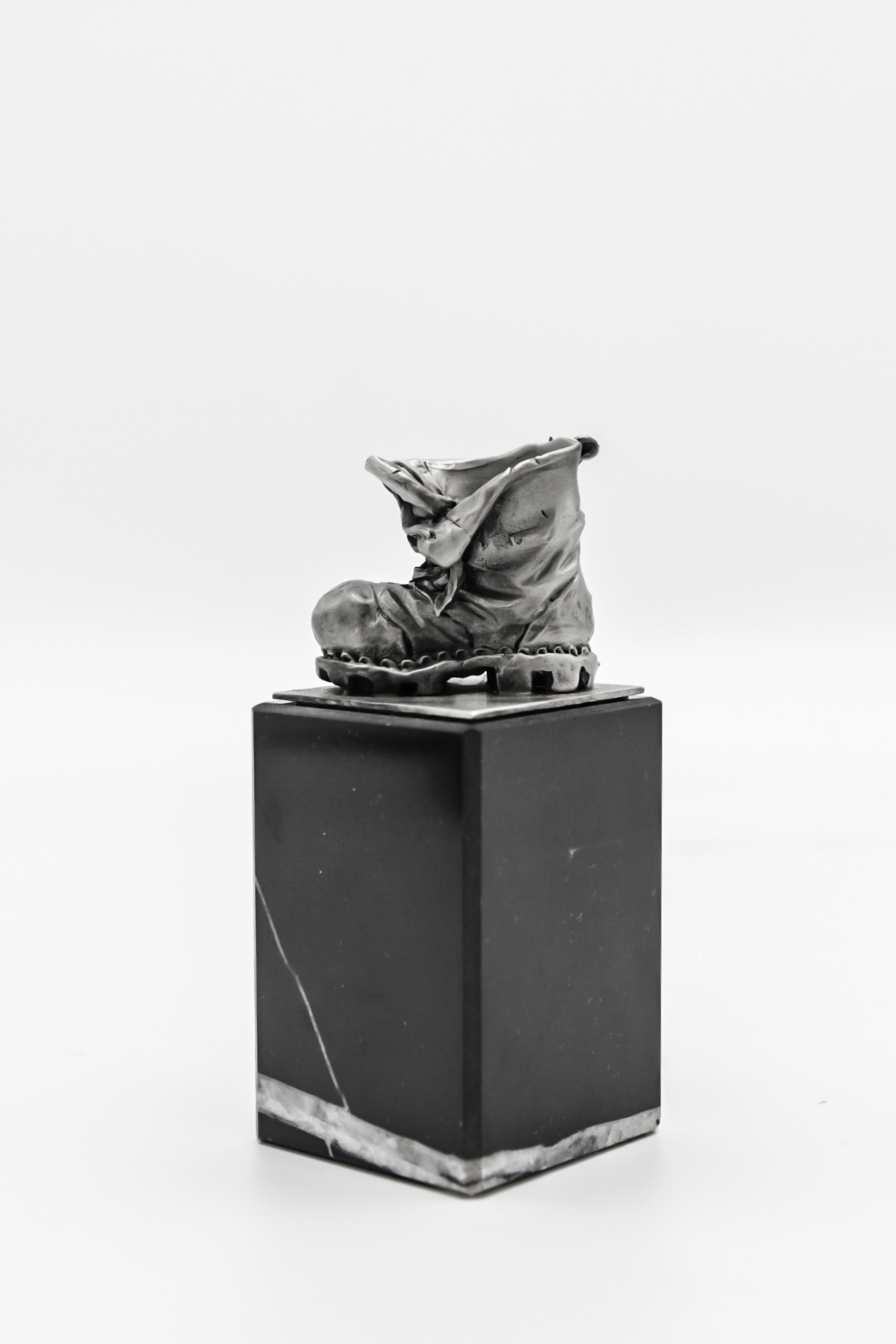 DTR Walking shoe on pedestal