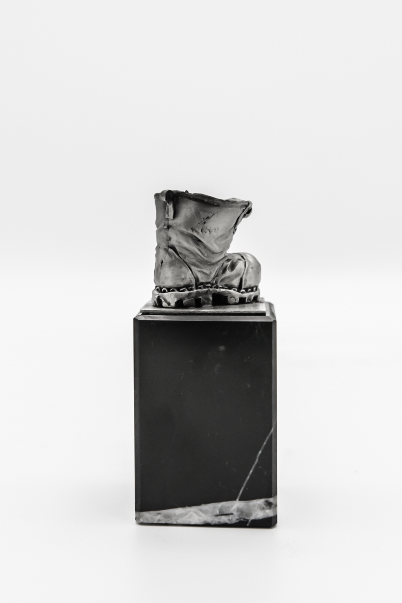 DTR Walking shoe on pedestal