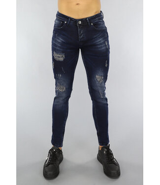 Donkerblauwe Jeans met Vintage Wash en Gaten