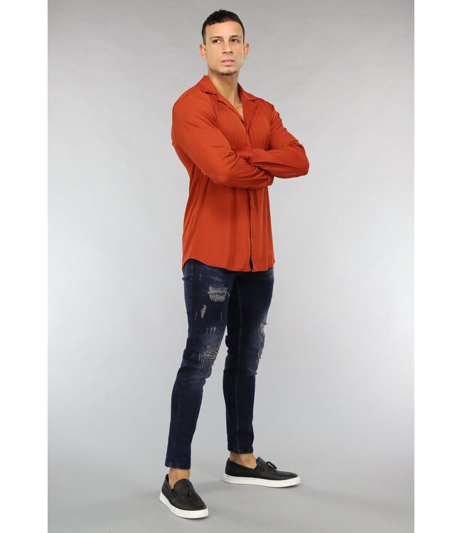 Donkerblauwe Jeans met Vintage Wash en Gaten
