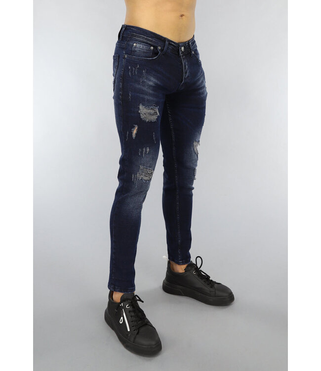 Donkerblauwe Jeans met Vintage Wash en Gaten