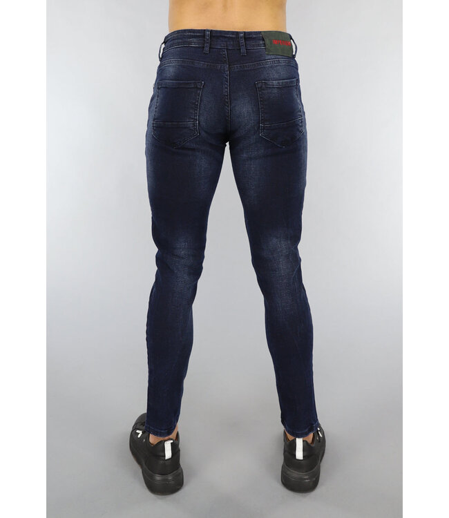 Donkerblauwe Jeans met Vintage Wash en Gaten