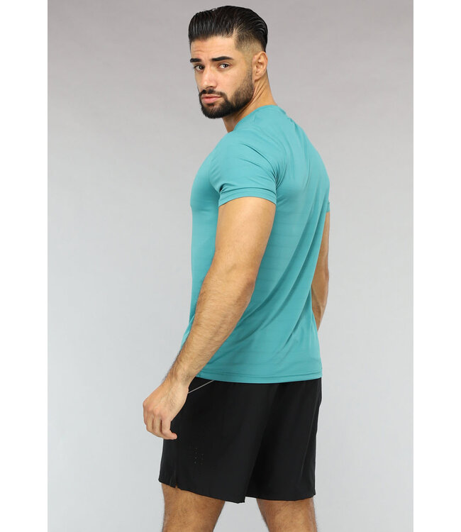 Ademende Turquoise Trainingstenue met Korte Broek